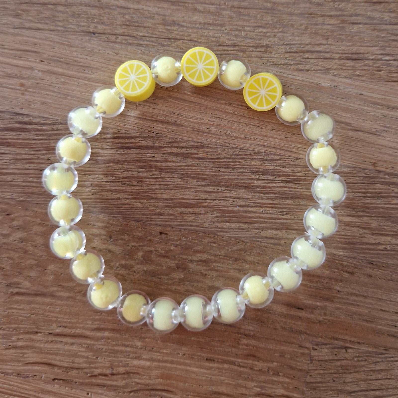 Gele armband dames, Ophalen of Verzenden, Geel
