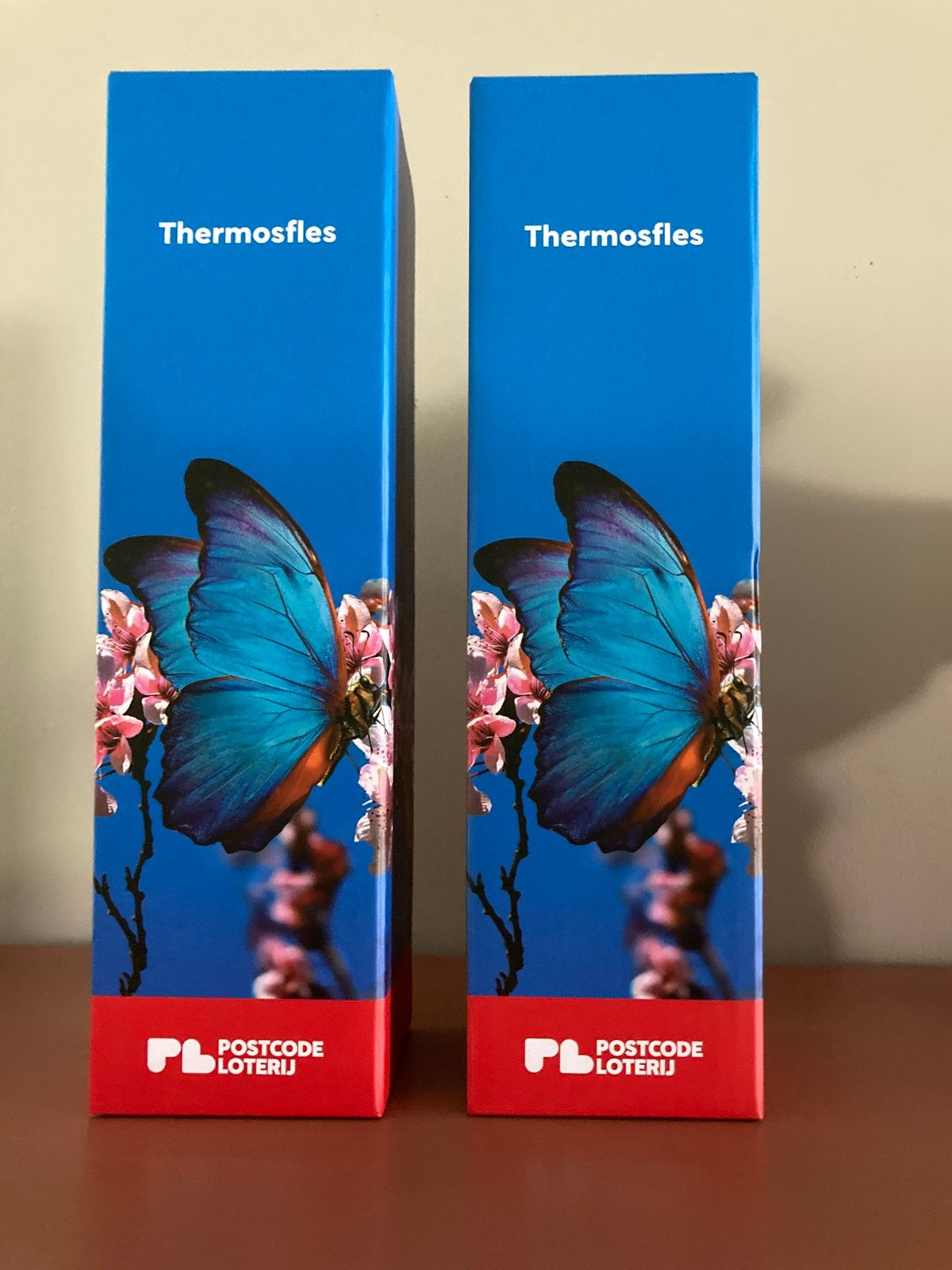 2 nieuwe verpakking thermo flessen vlinder postcodeloterij, Huis en Inrichting, Keuken | Servies, Ophalen of Verzenden, Nieuw