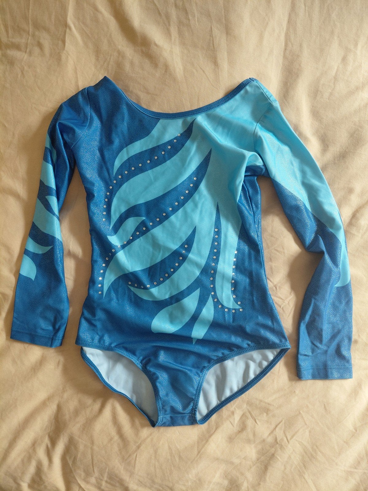 Turnpakje blauw met lange mouwen en steentjes, Gebruikt, Blauw, Turnpak(je), Kindermaat 122 t/m 140