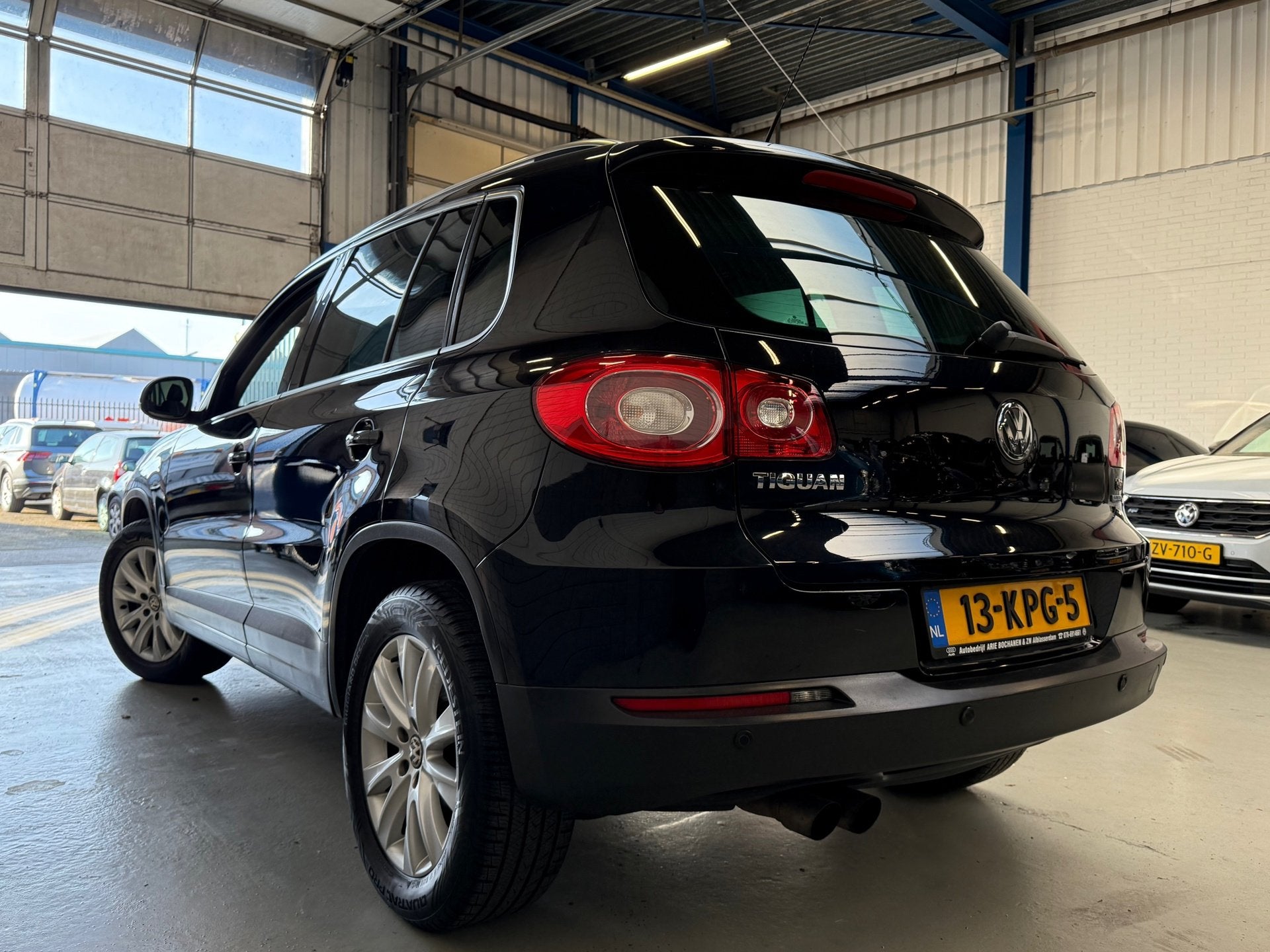 Volkswagen Tiguan 1.4 TSI Sport&Style, Auto's, Voorwielaandrijving, Euro 5, Zwart, 4 cilinders