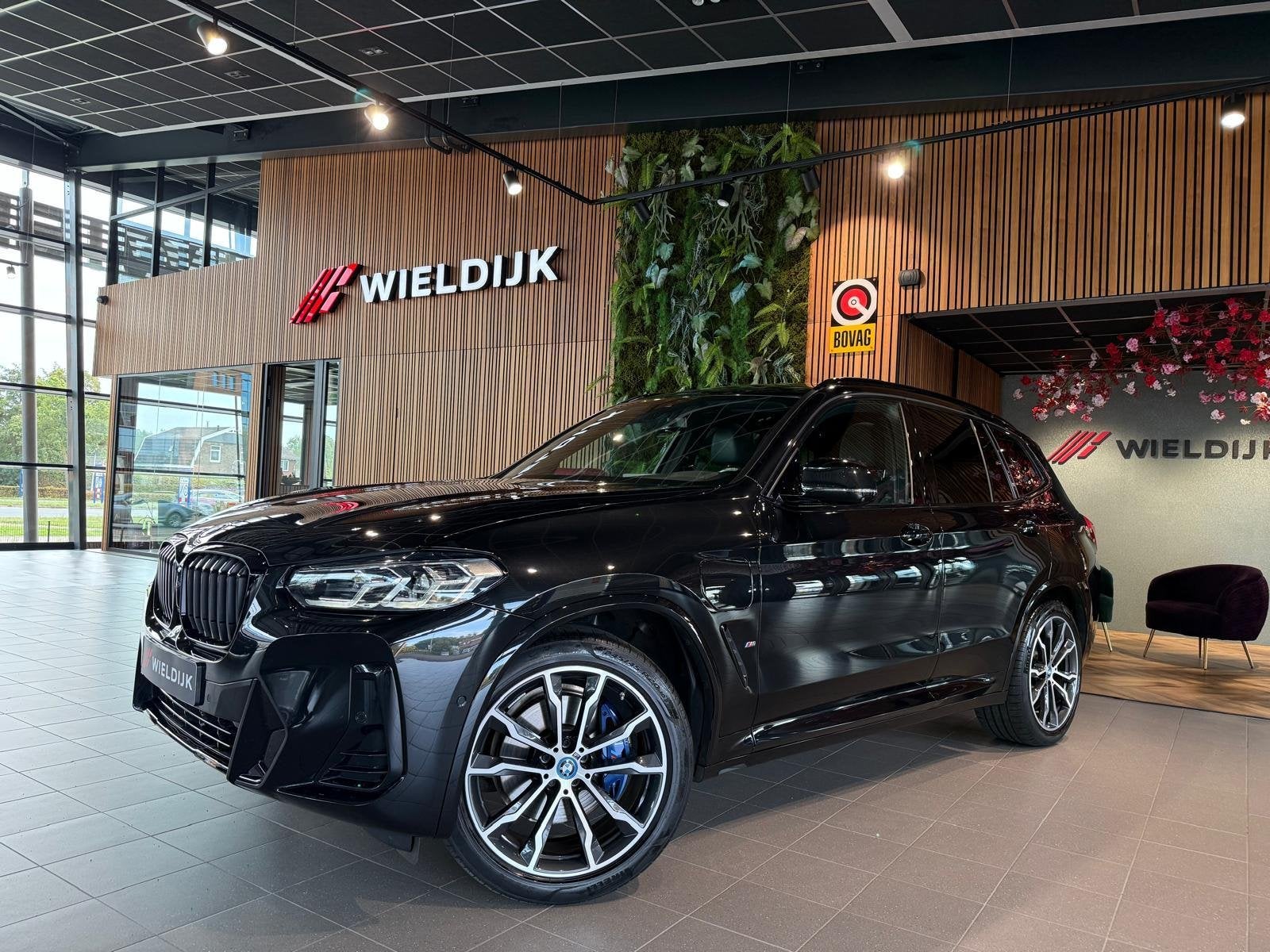 BMW X3 xDrive30e Business Edition Plus pano schuif trekhaak, Auto's, 4 cilinders, 2000 kg, Zwart, Bedrijf