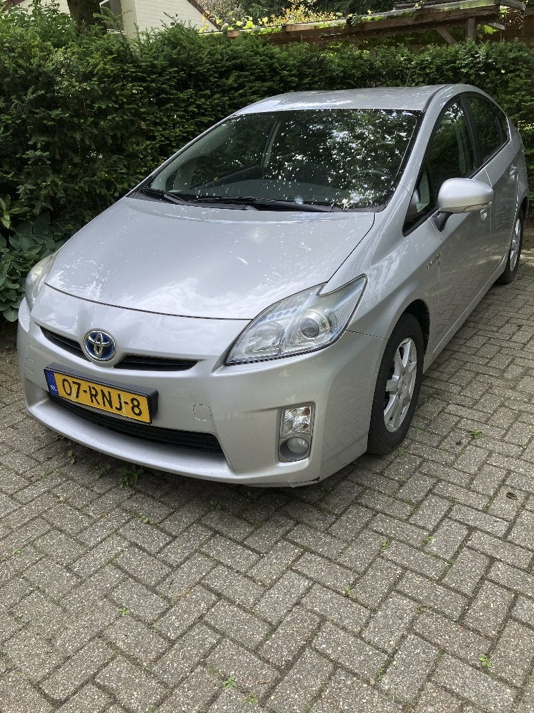 Toyota Prius 1.8 Full Hybrid 136PK Aut 2011 Grijs, Auto's, Toyota, Zwart, 4 cilinders, Automatische klimaatregeling, Leder