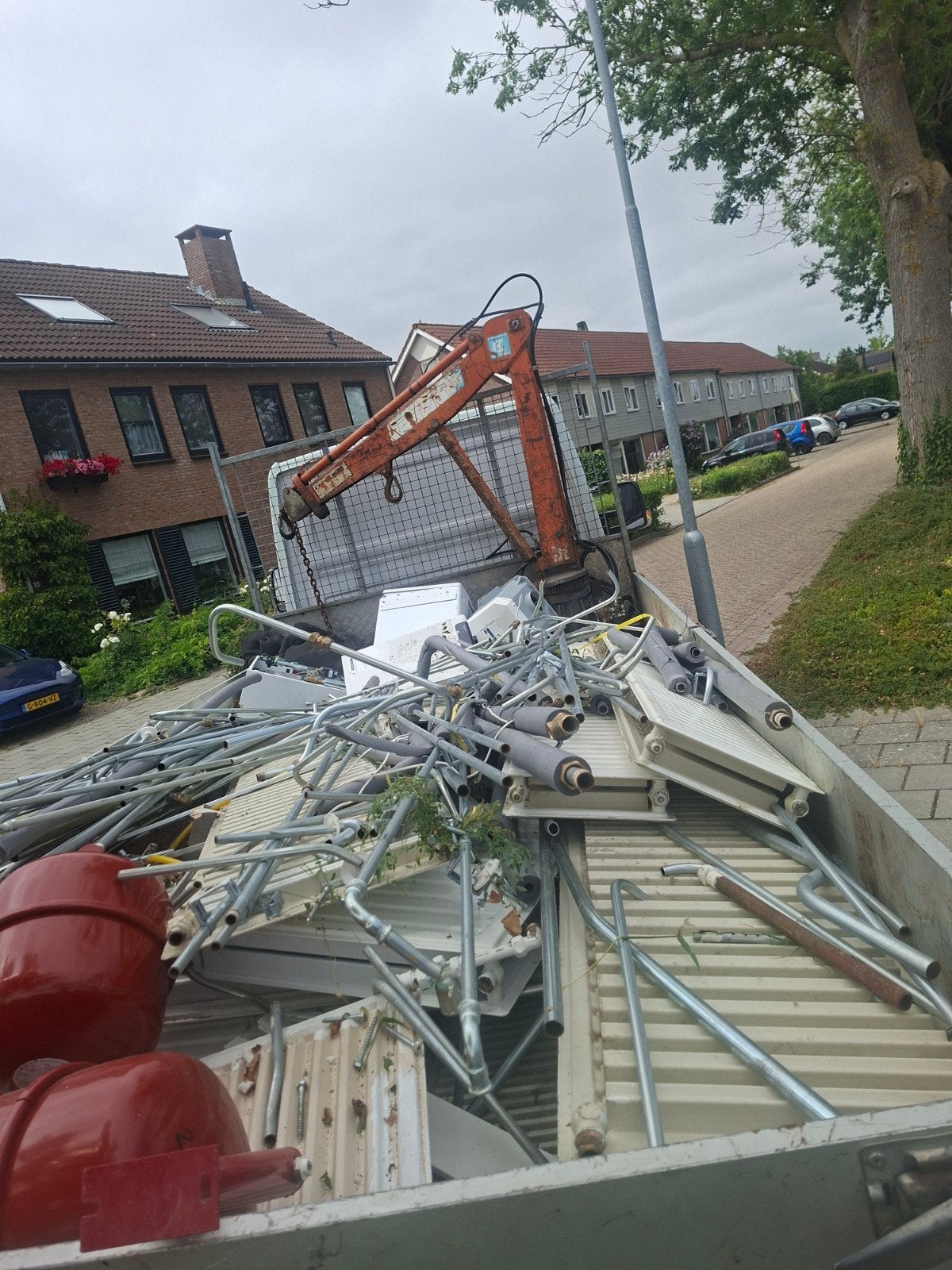 gevraagd oud ijzer en metalen, Ophalen