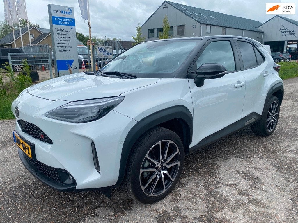 Toyota Yaris Cross 1.5 Hybrid GR Sport, Gebruikt, Automatische klimaatregeling, Leder en Stof, 1490 cc
