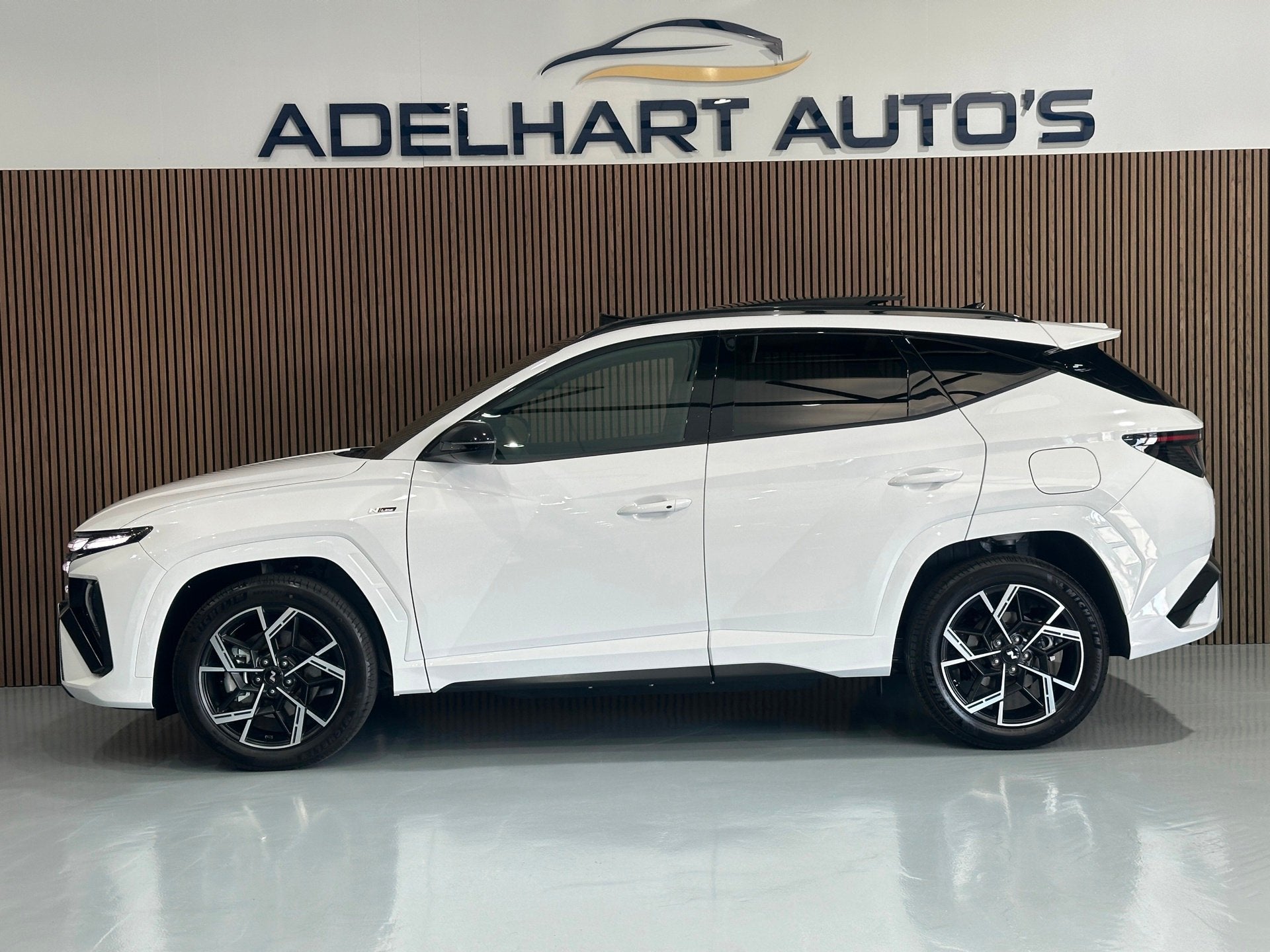 Hyundai Tucson 1.6 T-GDI PHEV N Line 4WD 265 PK Panorama dak, Automaat, 1814 kg, 4 cilinders, Wit