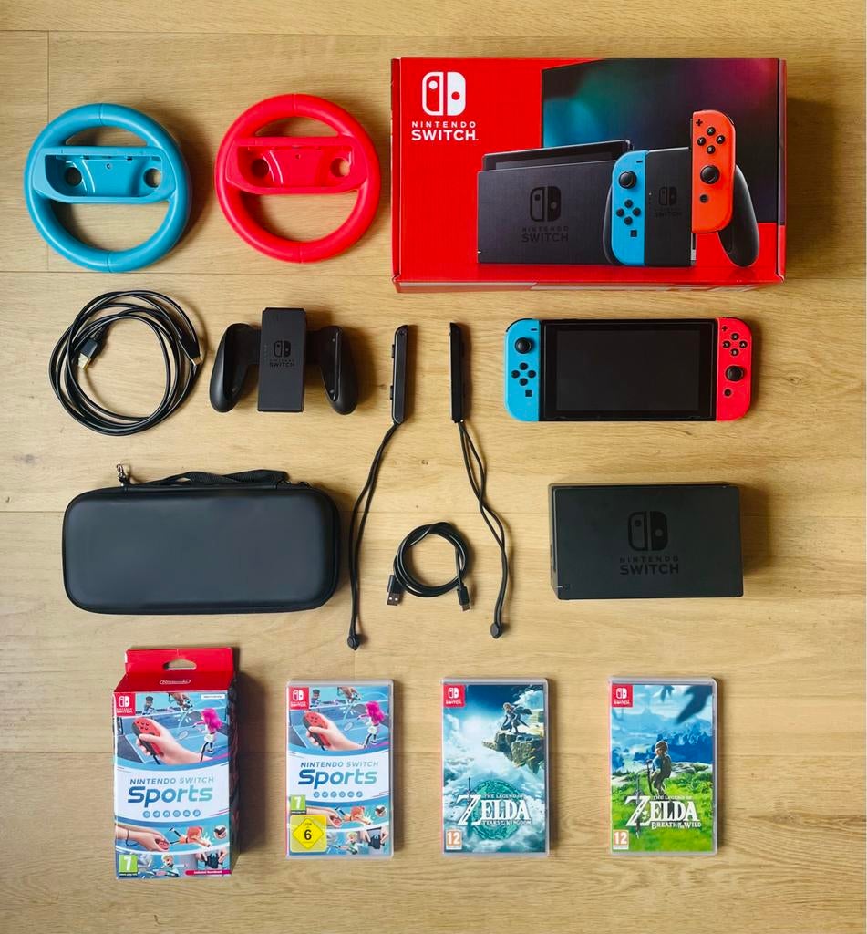 Nintendo Switch (V2) met 7 games en accessoires, Spelcomputers en Games, Switch 2019 Upgrade, Met games, Met 2 controllers, Ophalen of Verzenden