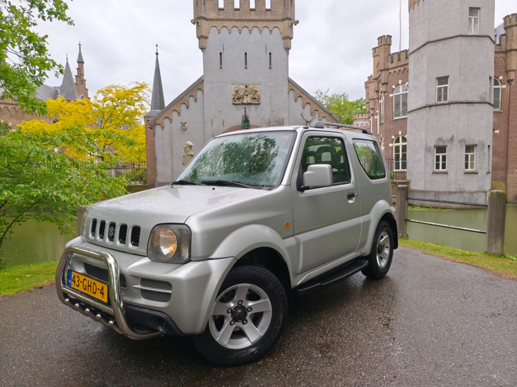 Suzuki Jimny 1.3 4WD AUTOMAAT / zeer mooi / apk 5-2027 / NAP, Stof, 40 €/maand, Zwart, 4 stoelen