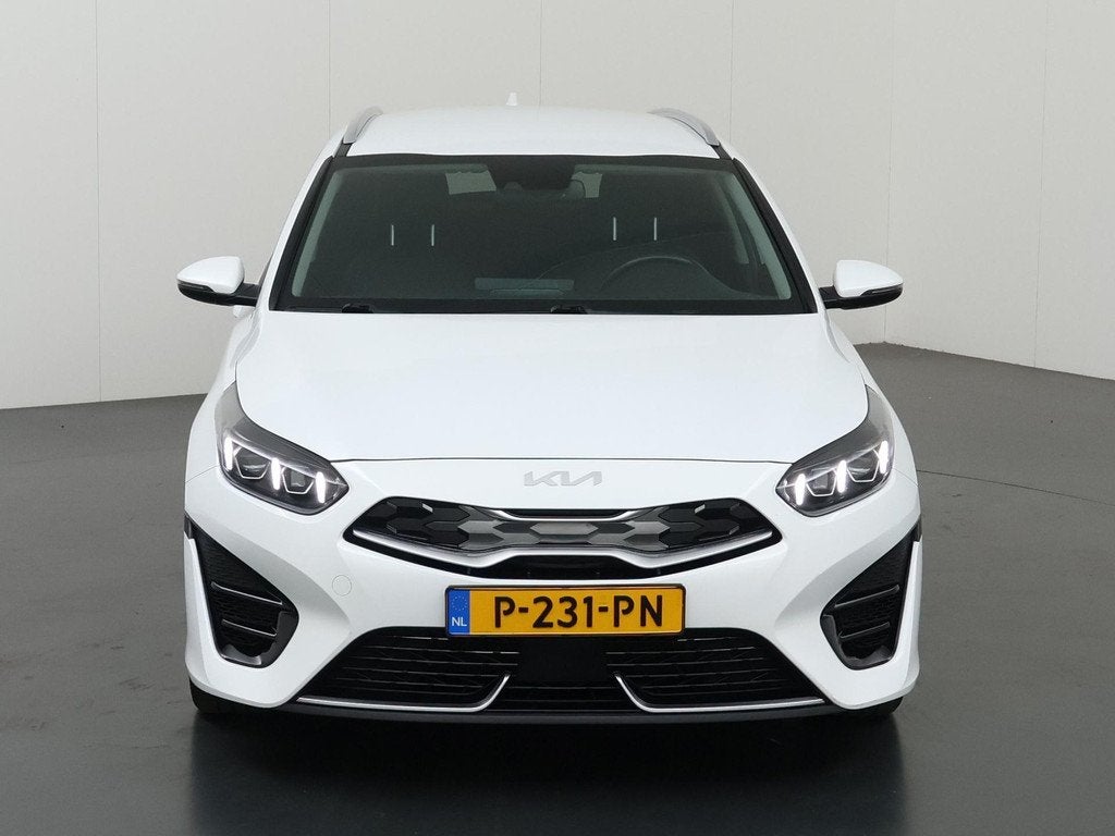 Kia Ceed Sportswagon 1.6 GDI PHEV DynamicPlusLine | Trekhaak, Gebruikt, Leder en Stof, Wit, 1508 kg