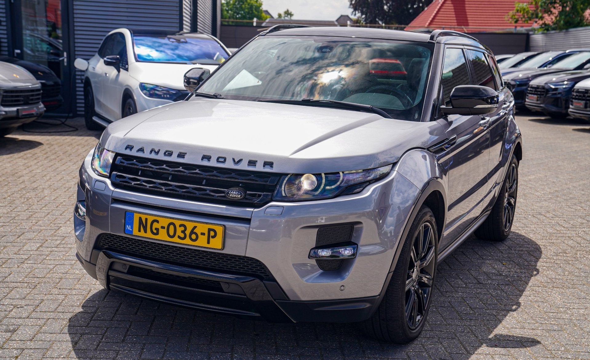 Land Rover Range Rover Evoque 2.0 Si 4WD Prestige | Panorama, Auto's, Zwart, 4 cilinders, Bedrijf, Vierwielaandrijving