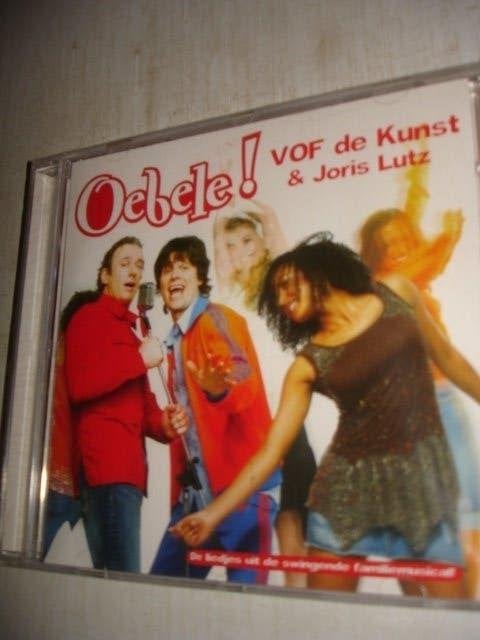V.O.F. de Kunst en Joris Lutz- Oebele !- (NIEUW/SEAL), Verzenden, Nieuw in verpakking