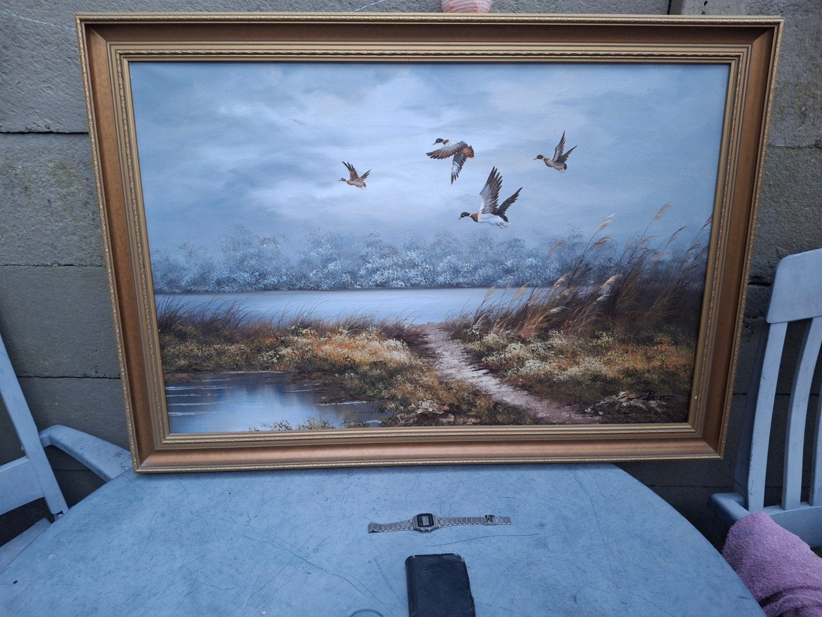 Schilderij van vliegende eenden boven waterlandschap, Ophalen