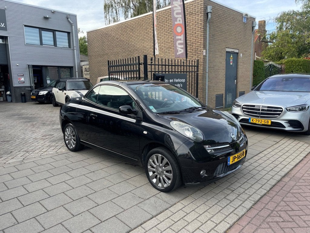 Nissan Micra C+C 1.6 Tekna Plus Trekhaak Airco Carplay/Andri, Voorwielaandrijving, 15 km/l, Gebruikt, 750 kg