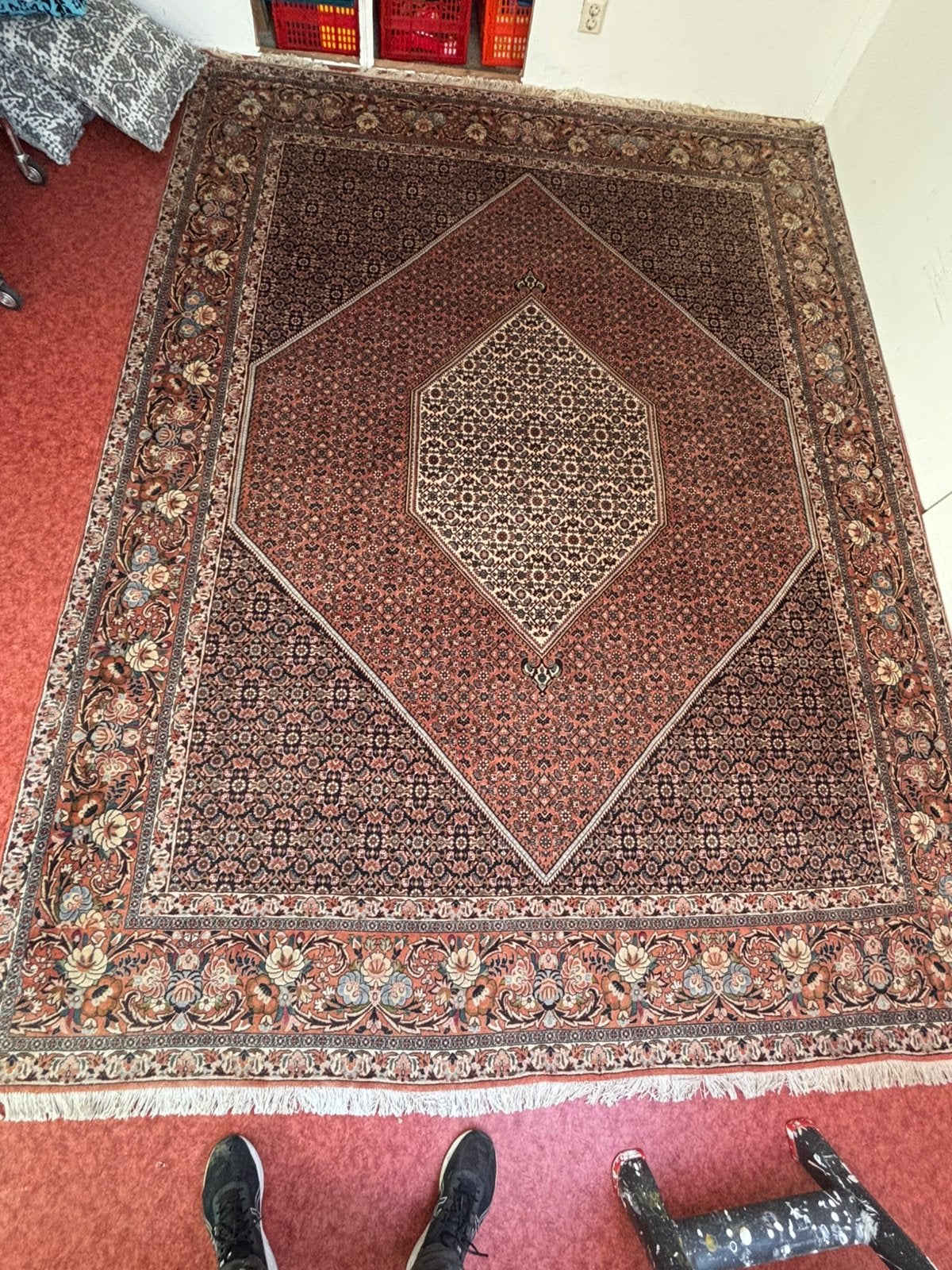 Perzisch tapijt, Ophalen