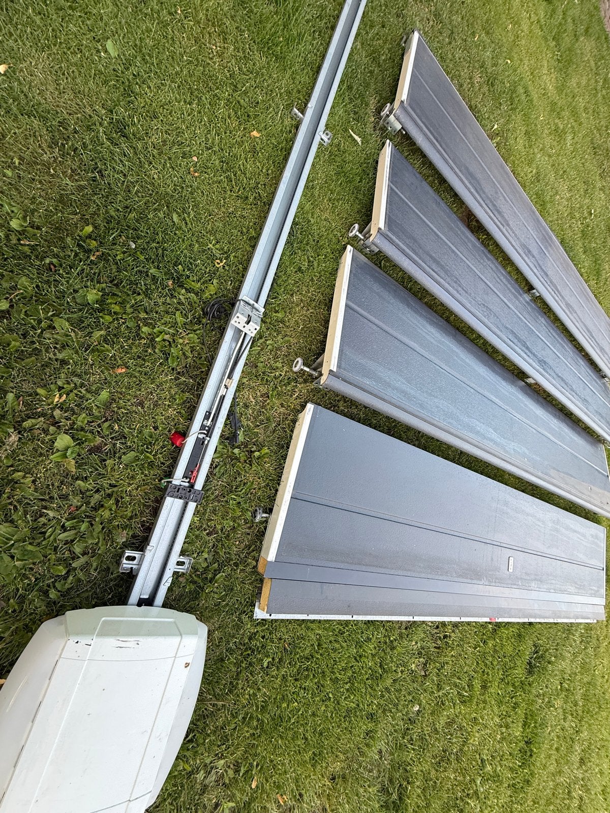 Geïsoleerde elektrische garagedeur, Doe-het-zelf en Verbouw, Deuren en Horren, Gebruikt, Garagedeur, 200 tot 215 cm, 120 cm of meer