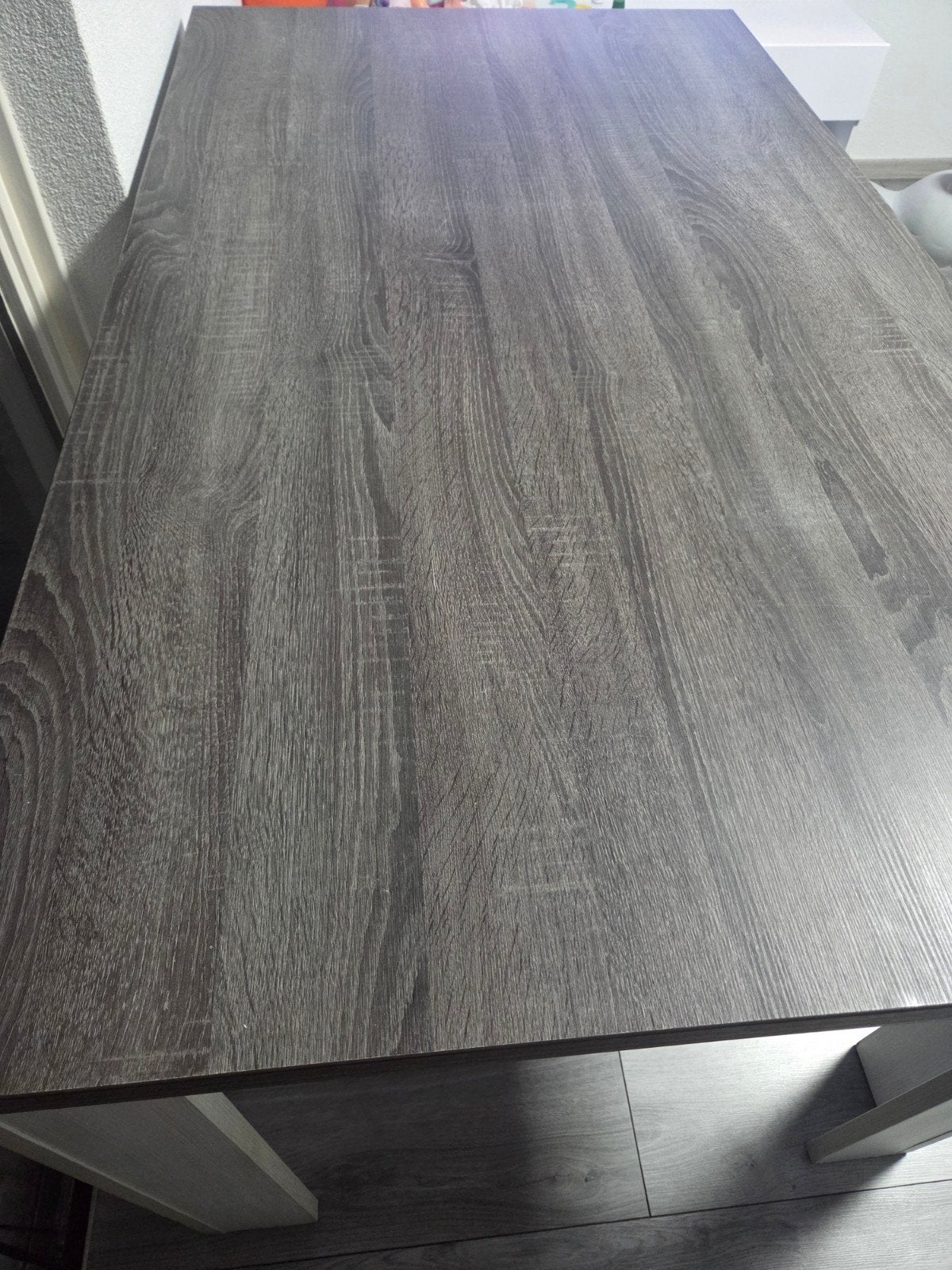 Moderne eettafel met houtlook blad en witte poten, Gebruikt, Overige materialen, 100 tot 150 cm, Modern