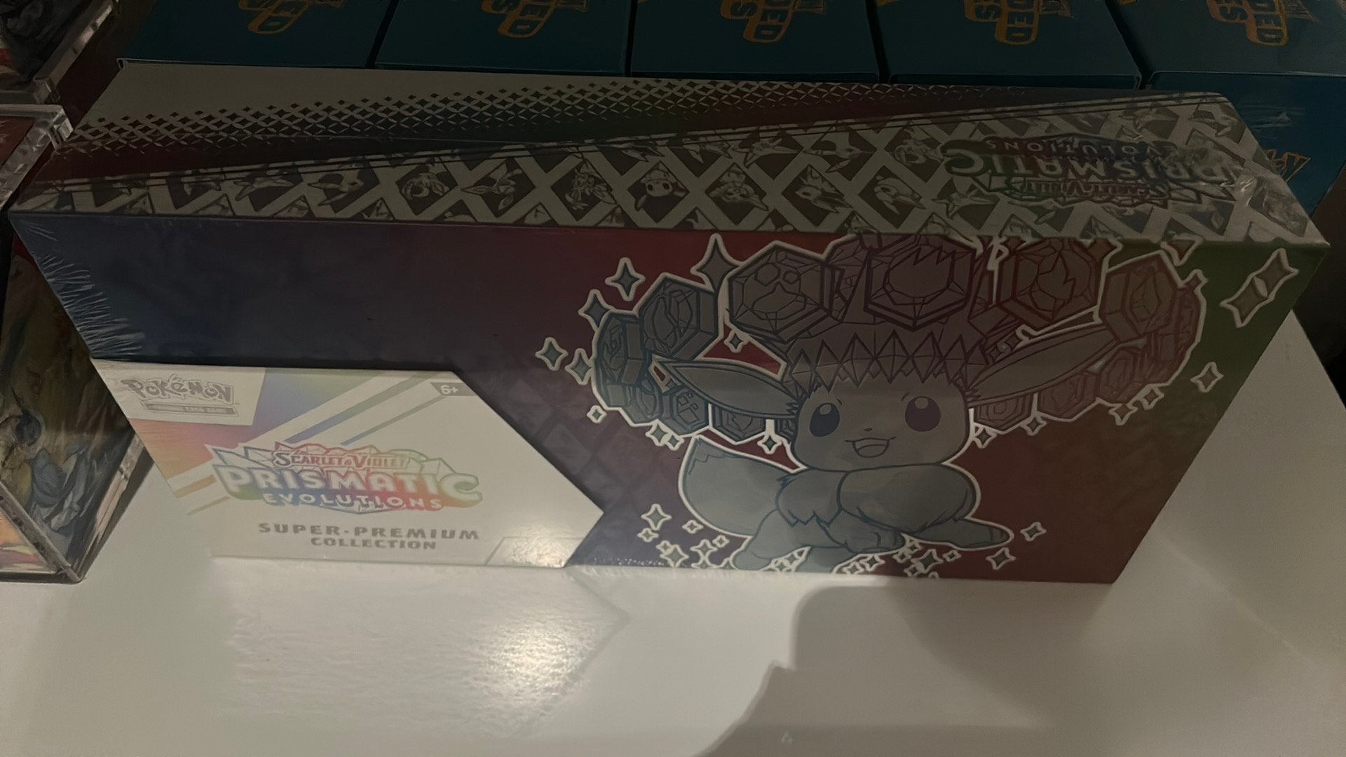 Pokemon Prismatic Super Premium Collection sealed, Ophalen, Zo goed als nieuw, Boosterbox