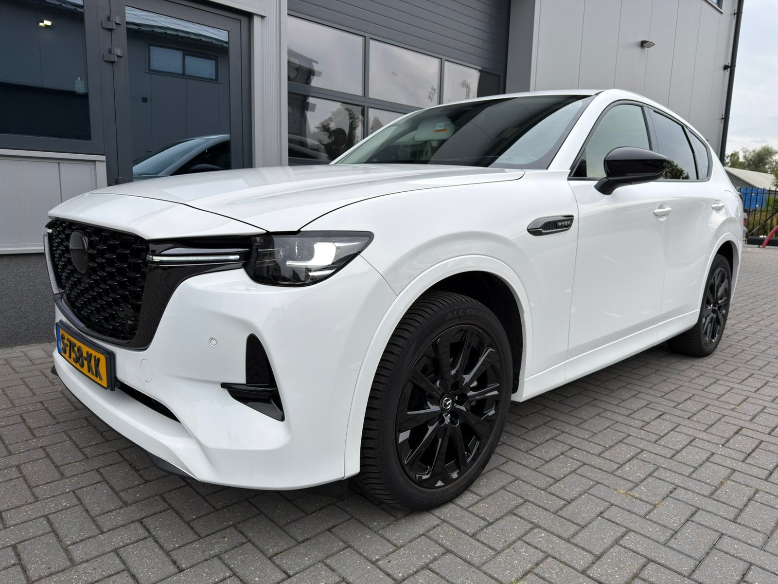 Mazda CX-60 2.5 Phev HOMURA, fabrieksgar, trekhaak (NL auto), Auto's, Automaat, Zwart, 327 pk, 2500 kg