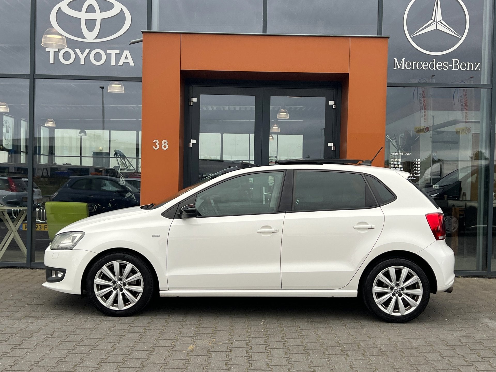 Volkswagen Polo 1.2TSI|Panodak|Stoelverw.|Xenon|Cruise|PDC, Voorwielaandrijving, Euro 5, Automatische klimaatregeling, Leder en Stof