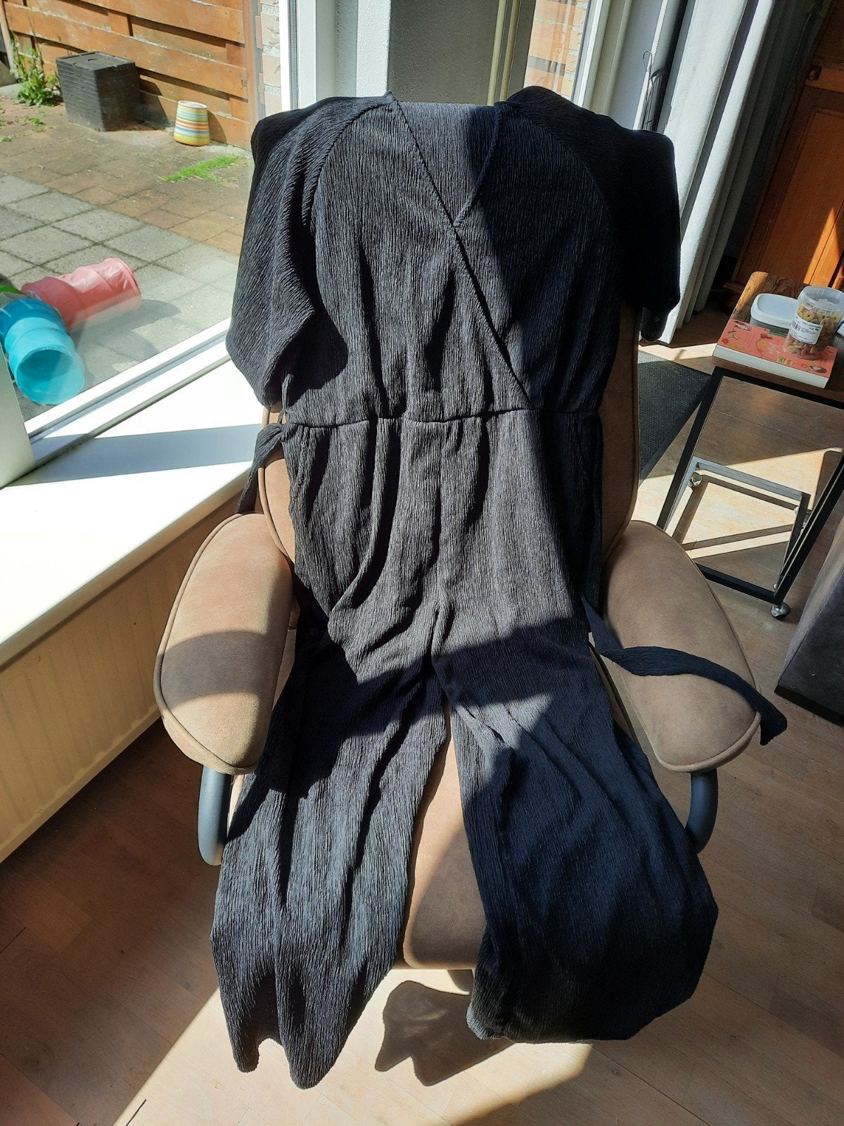 Zwarte jumpsuit L/XL, zo goed als nieuw, Kleding | Dames, Jumpsuits, Ophalen of Verzenden, Zo goed als nieuw, Maat 42/44 (L), Zwart