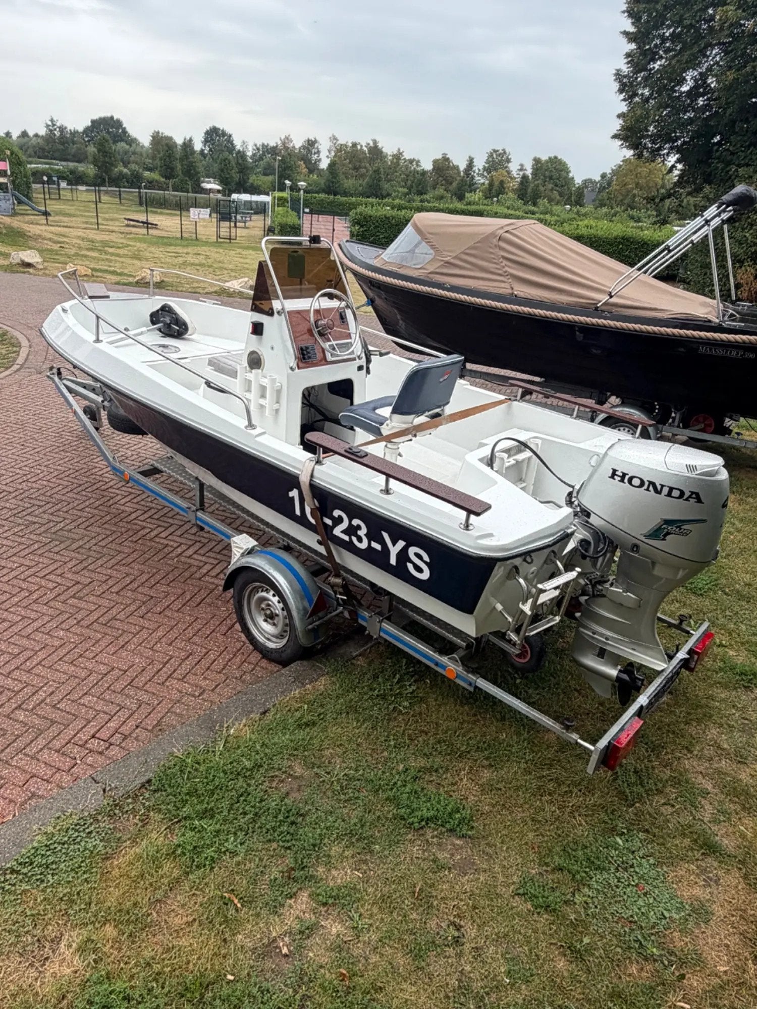 Elan 450 Inc Honda 40pk en trailer in nieuwstaat, Overige merken, Gebruikt, Overige brandstoffen, 5 m