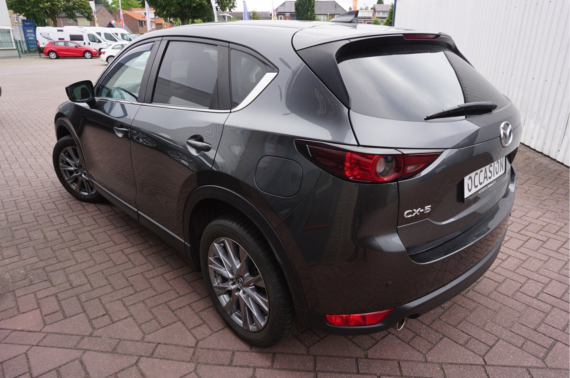 Mazda CX-5 2.0 SkyActiv-G 165 Comfort Automaat (bj 2021), Auto's, Stof, Gebruikt, Zwart, 4 cilinders