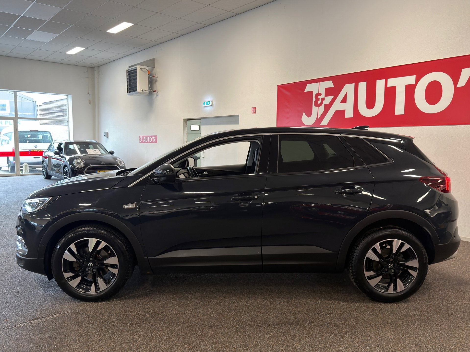 Opel Grandland X 1.2 Turbo Ultimate|NAVIGATIE\CAMERA|CRUISE|, Stof, Gebruikt, 1199 cc, Met garantie (alle)