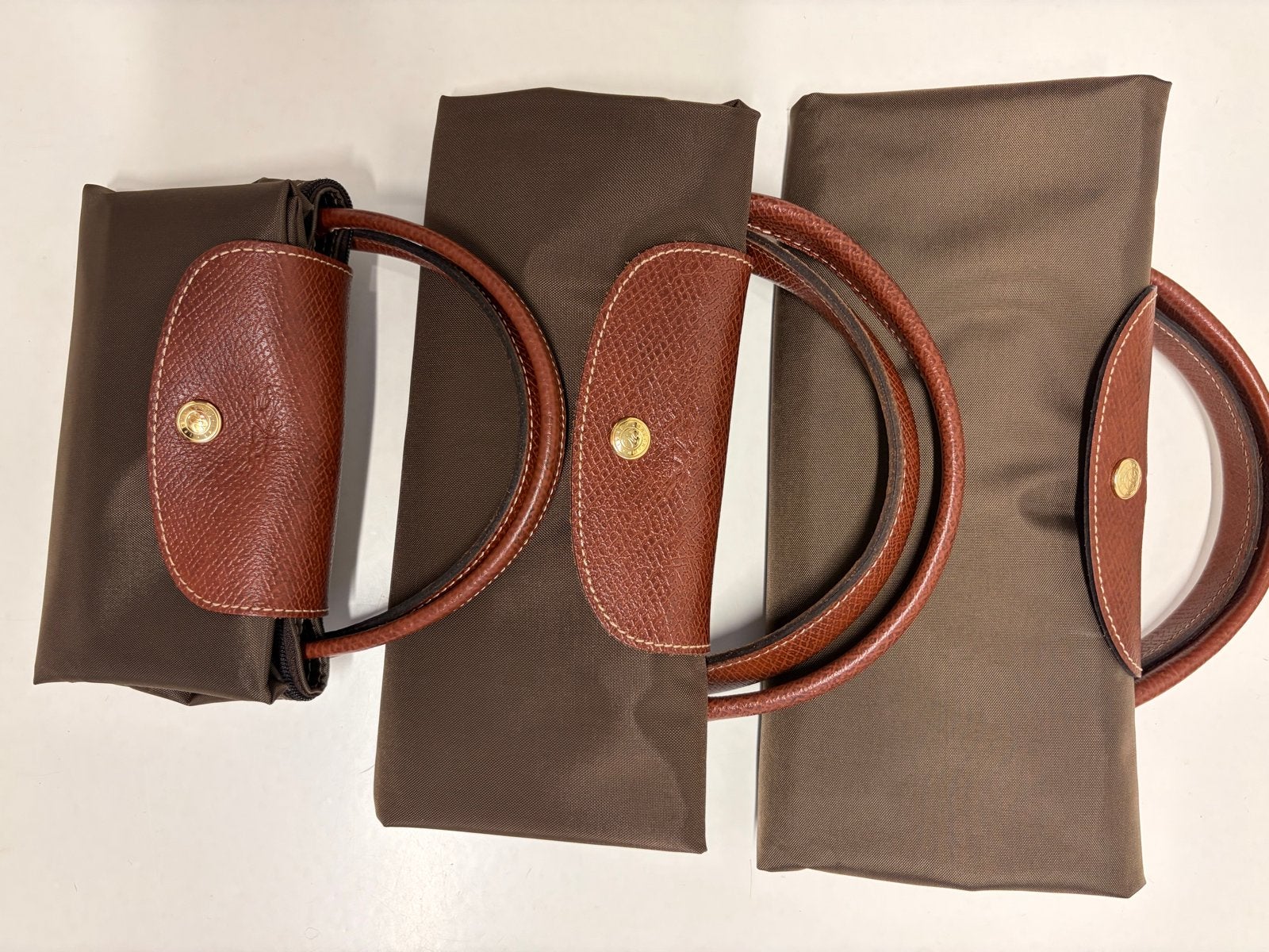 Longchamp Le Pliage Reistassen - Diverse Maten, Ophalen of Verzenden, Zo goed als nieuw, Bruin, Overige typen