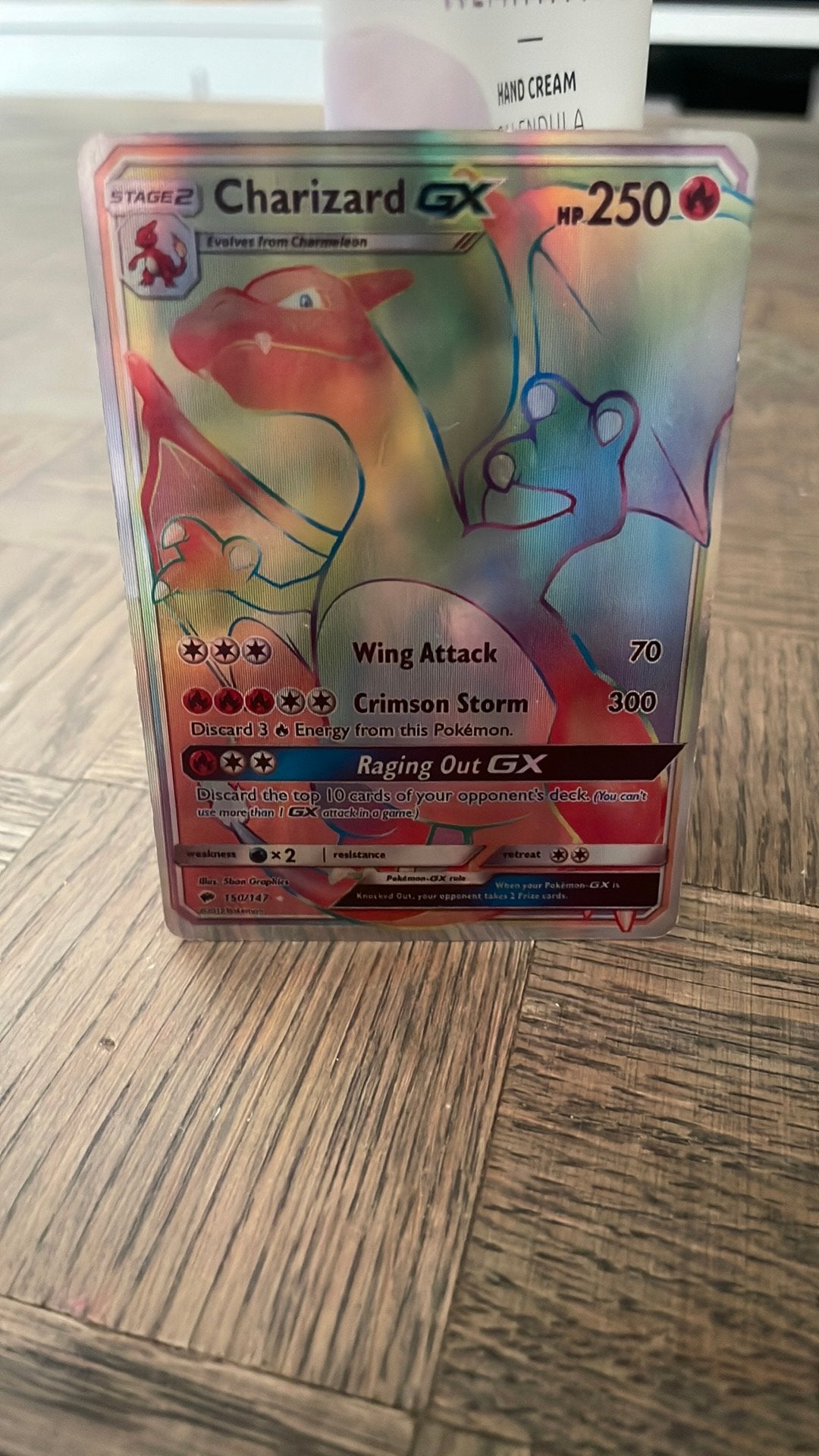 Charizard-GX (Rainbow Rare) #150/147  Sun & Moon (2017)., Verzenden, Zo goed als nieuw