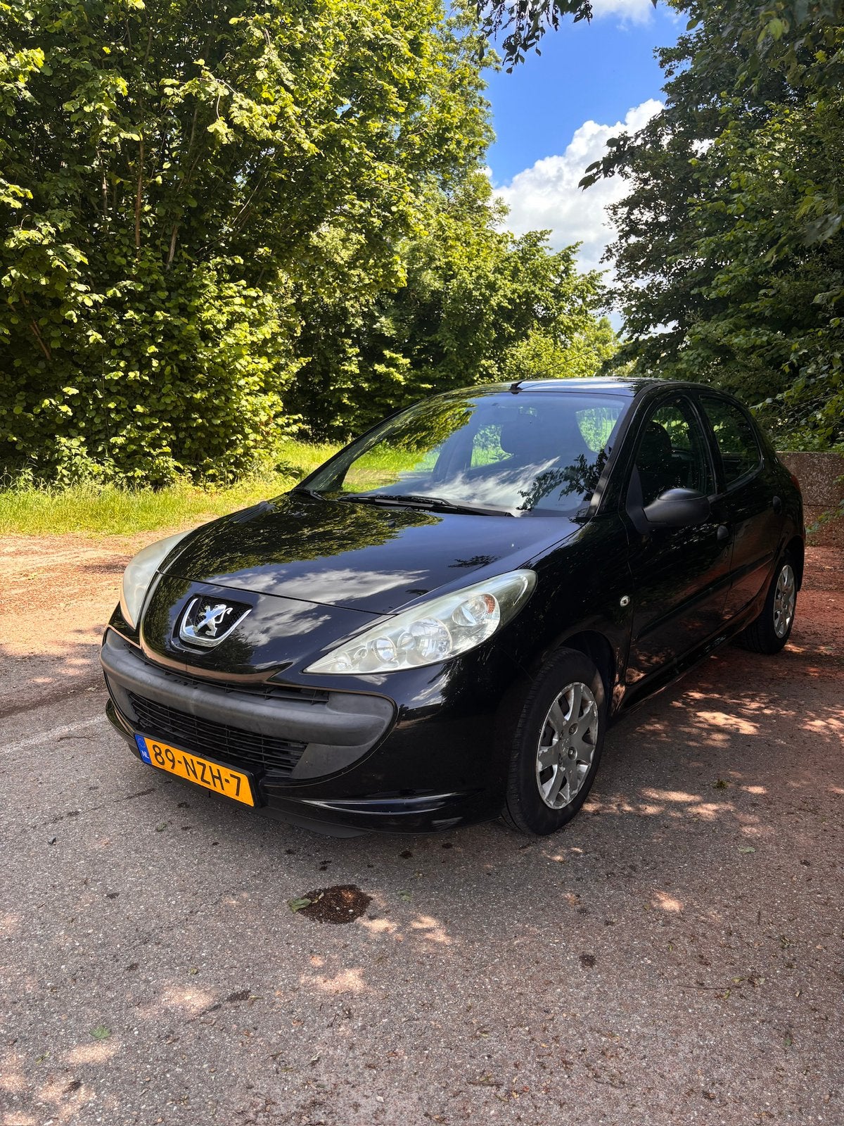 Peugeot 206+ 1.1 5D 2011 Zwart, Auto's, Peugeot, Voorwielaandrijving, 206+, Stof, 4 cilinders
