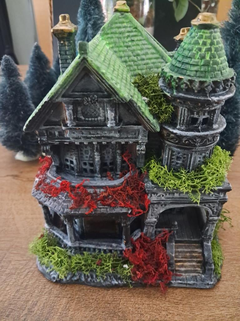 Kersthuisje voor in een kerstdorp, Ophalen