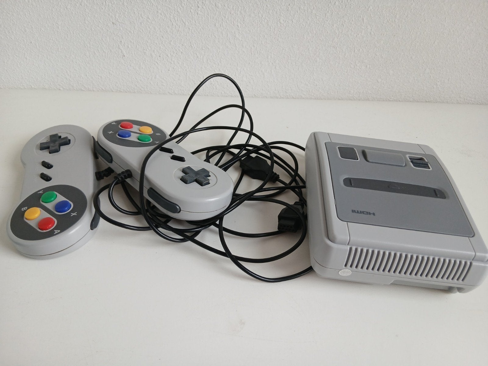 mini spelcomputer. werkt niet meer volgens mijn zoon., Ophalen of Verzenden, Met 2 controllers