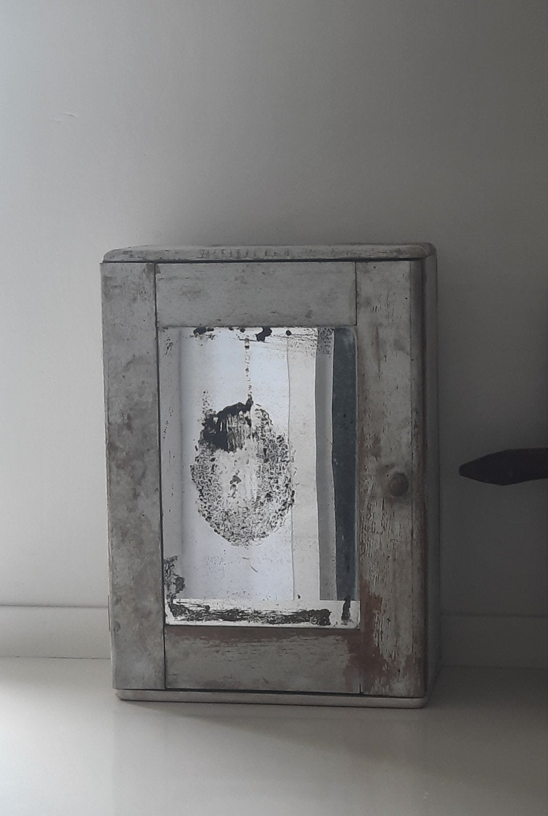Spiegelkastje (nuzzelspul), Ophalen