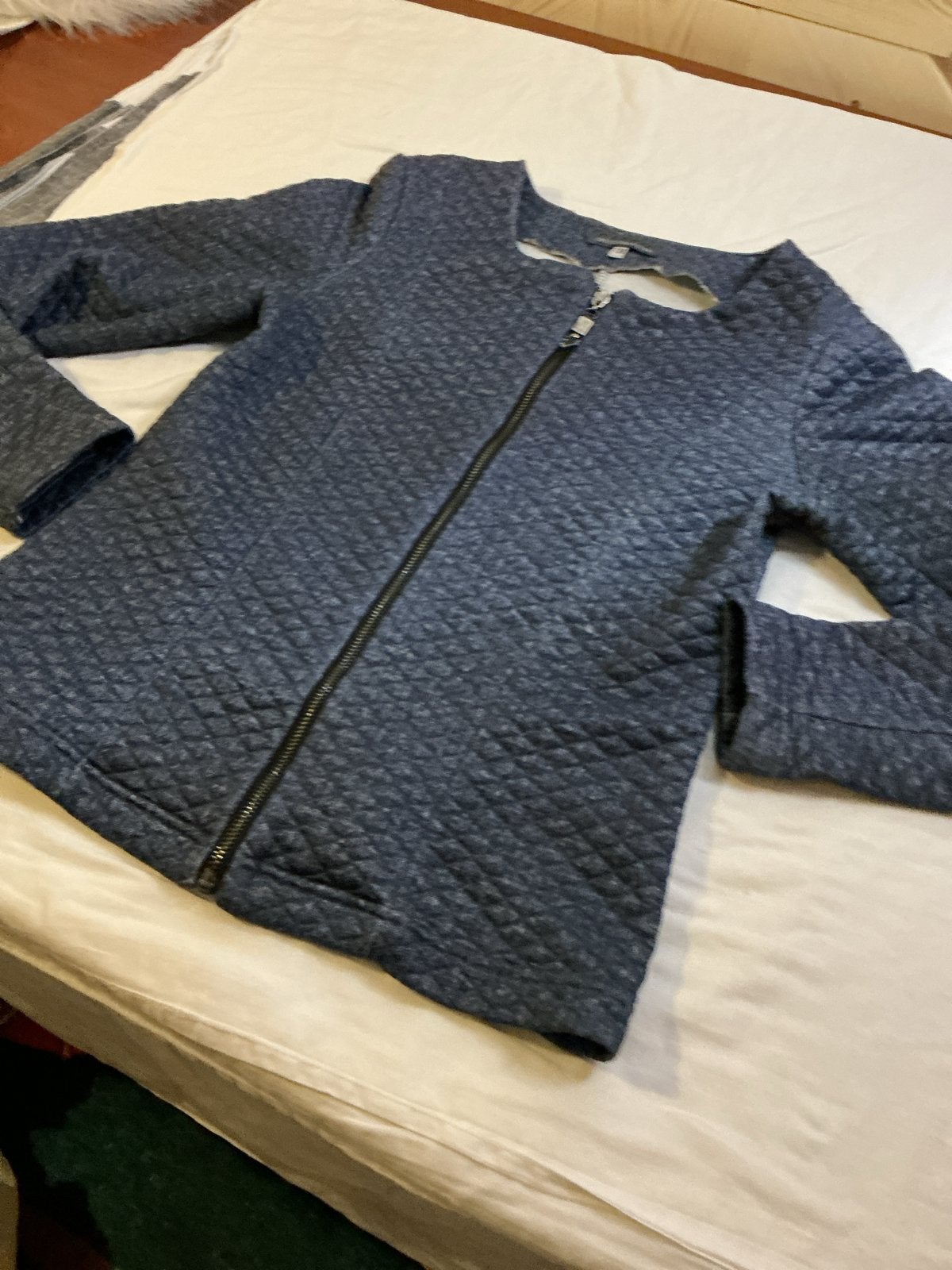 Donkerblauwe gewatteerde  vest meisjes met rits maat 140, Ophalen of Verzenden, Zo goed als nieuw
