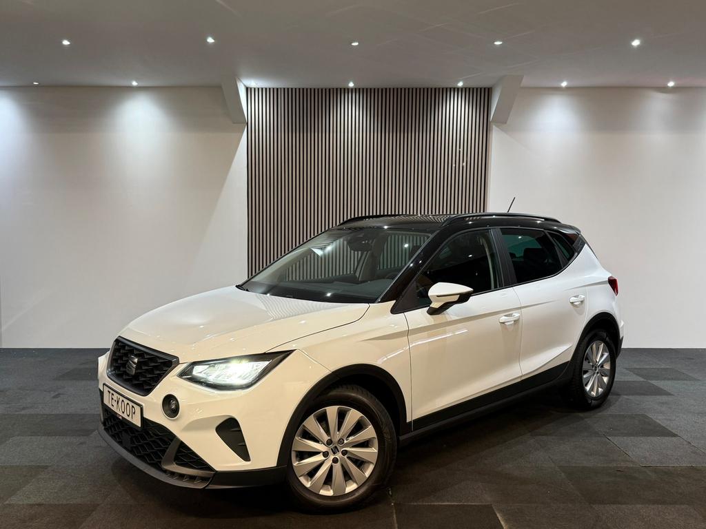 Seat Arona 1.0 TSI 110pk 2023 Business Intense Plus DSG Navi, Auto's, Stof, 1133 kg, 610 kg, Wit