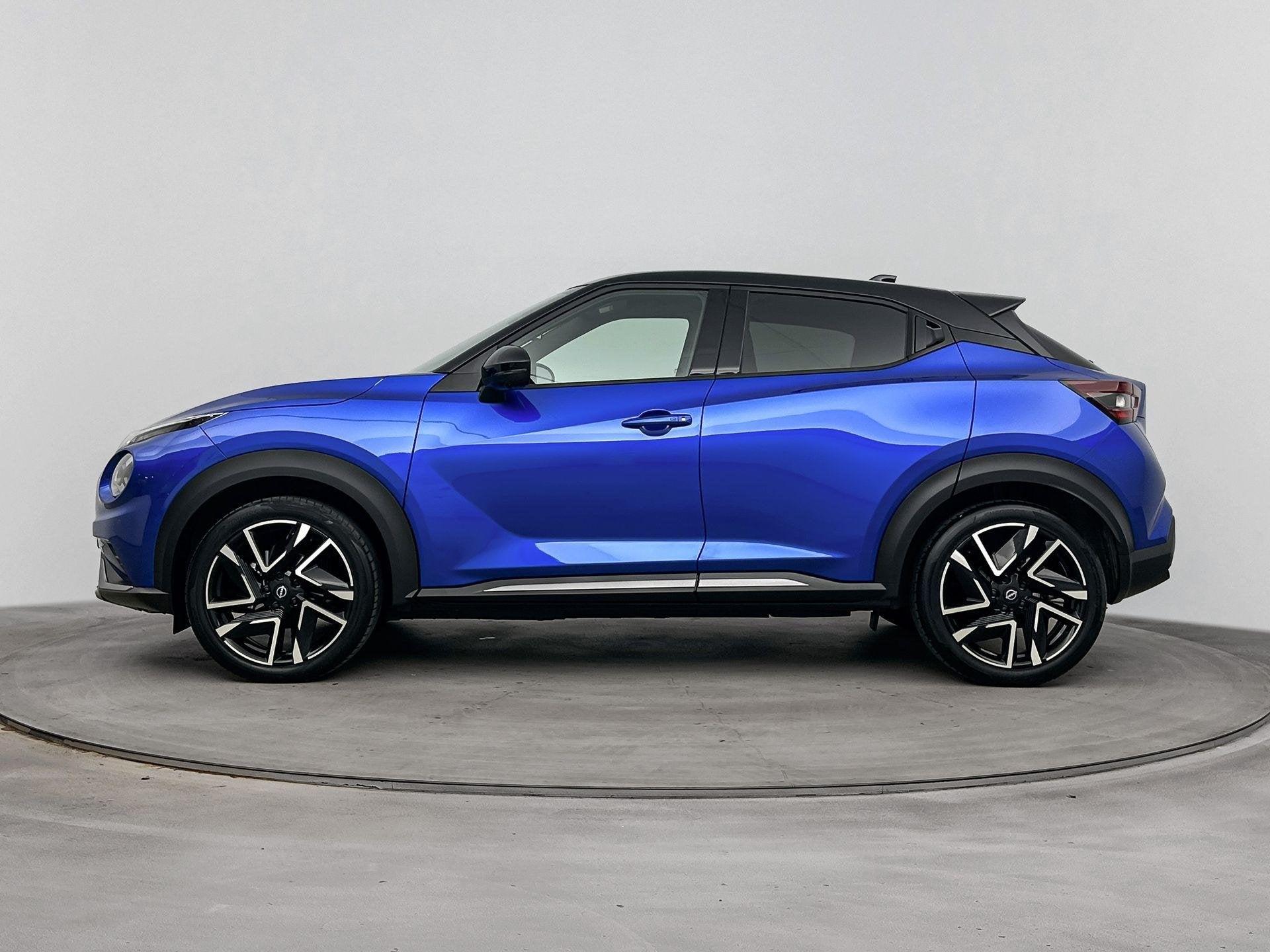 Nissan Juke 1.6 Hybrid N-Design 143PK | Automaat | Navigatie, Stof, Gebruikt, Blauw, Automatische klimaatregeling