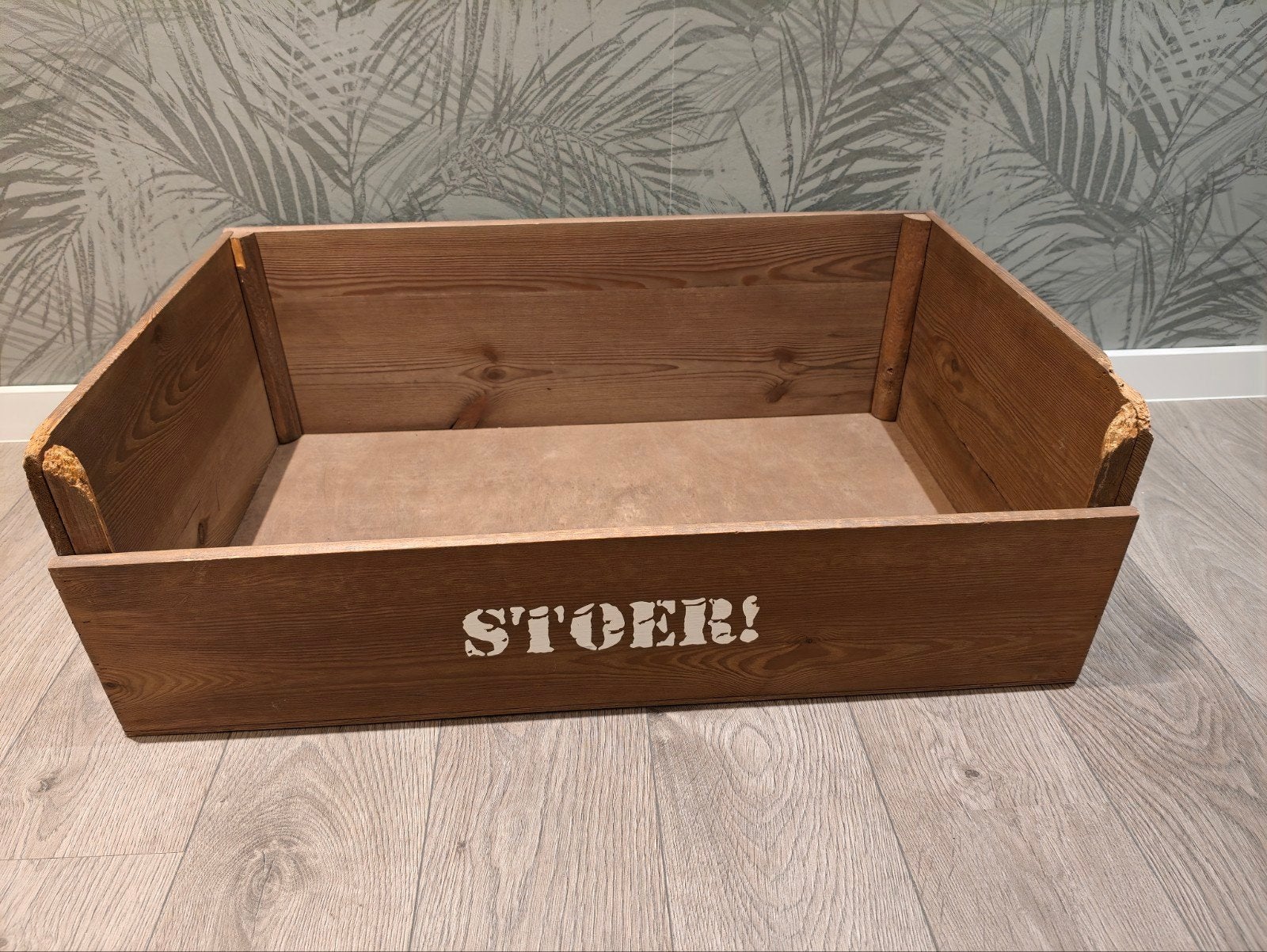 Stoer! hondenmand hout, Ophalen