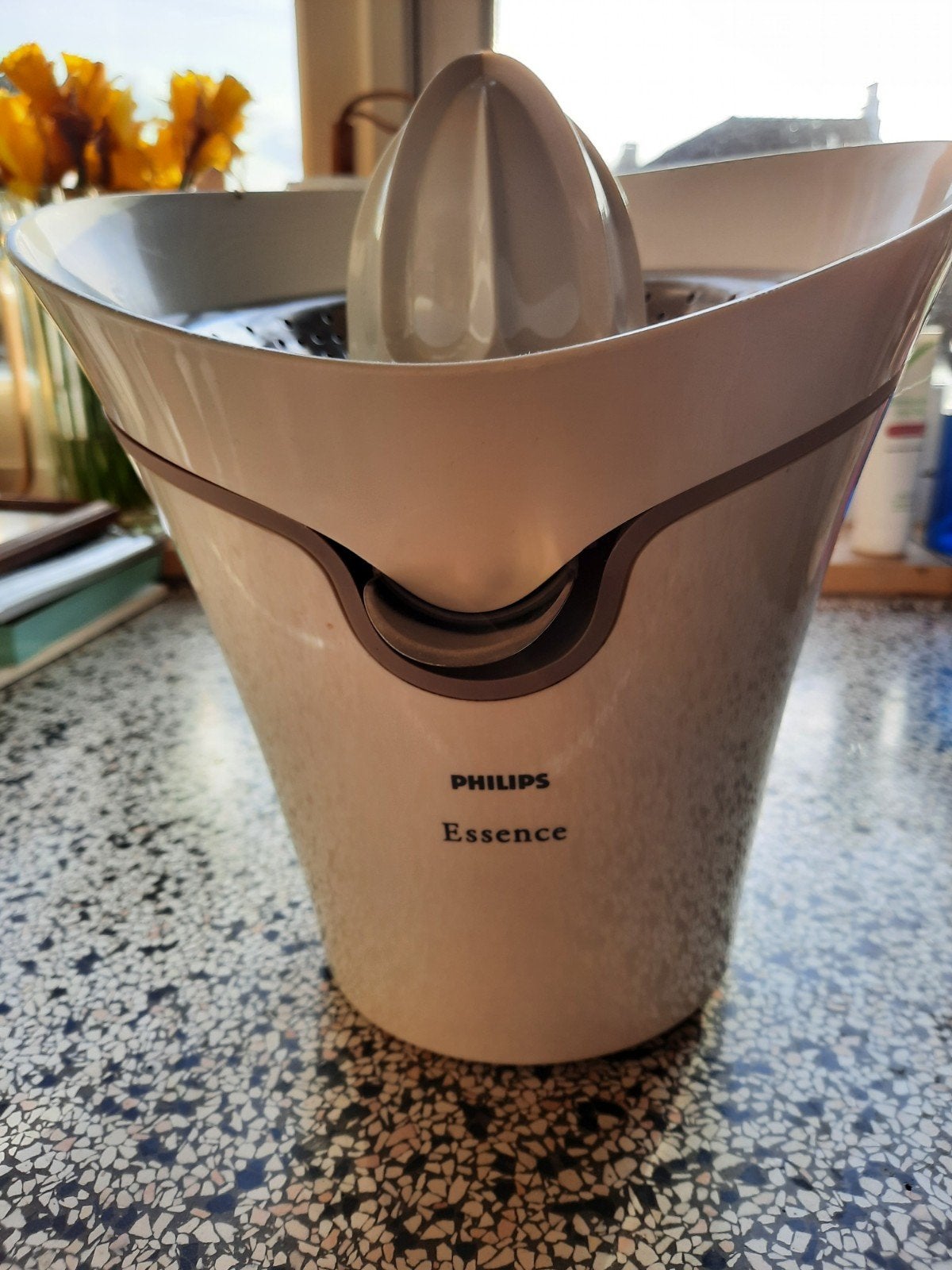 Sinaasappel pers Philips essence, Ophalen