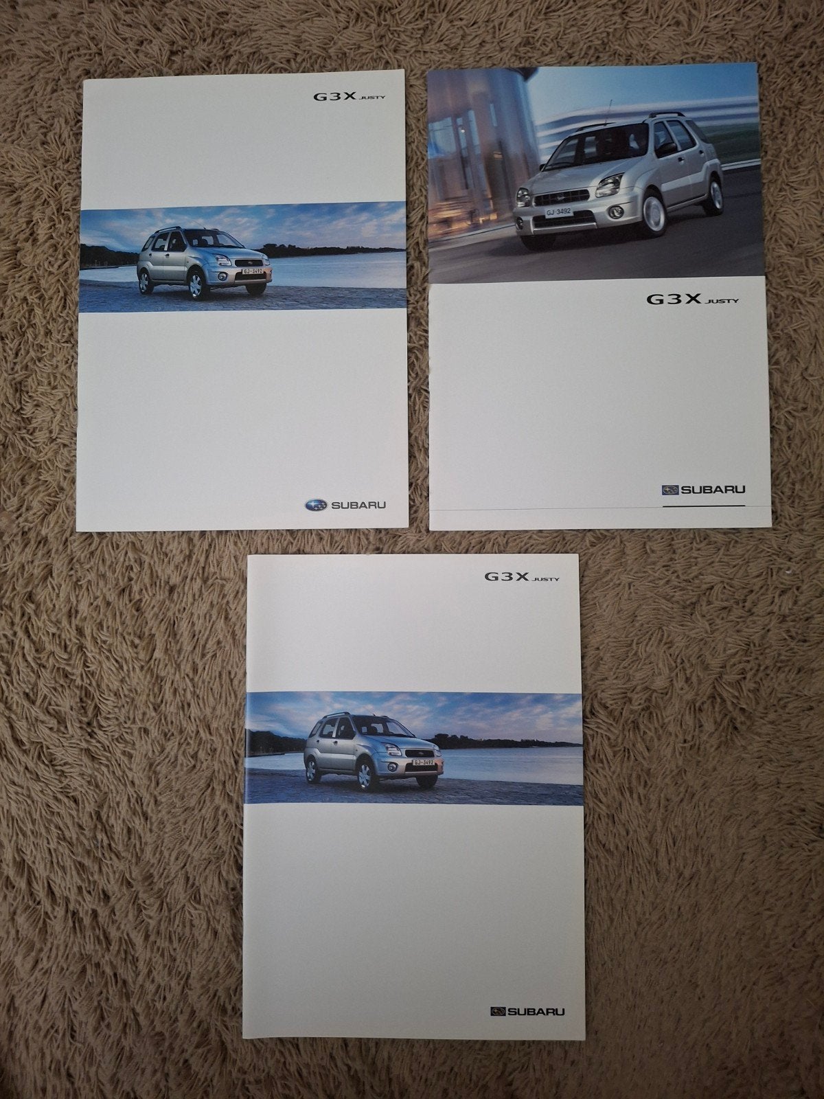 3x autofolder Subaru G3X Justy, Verzenden, Gelezen, Overige merken