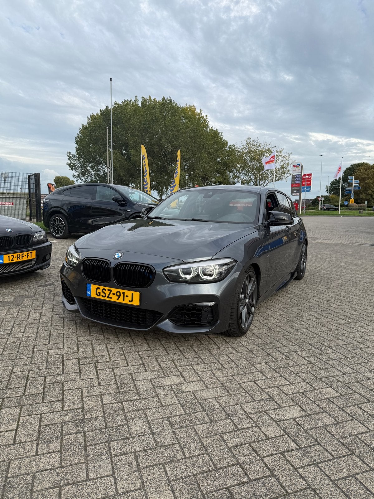 BMW 1-Serie M140i Xdrive Aut 2019 Grijs, Auto's, 340 pk, Leder, Vierwielaandrijving, Particulier