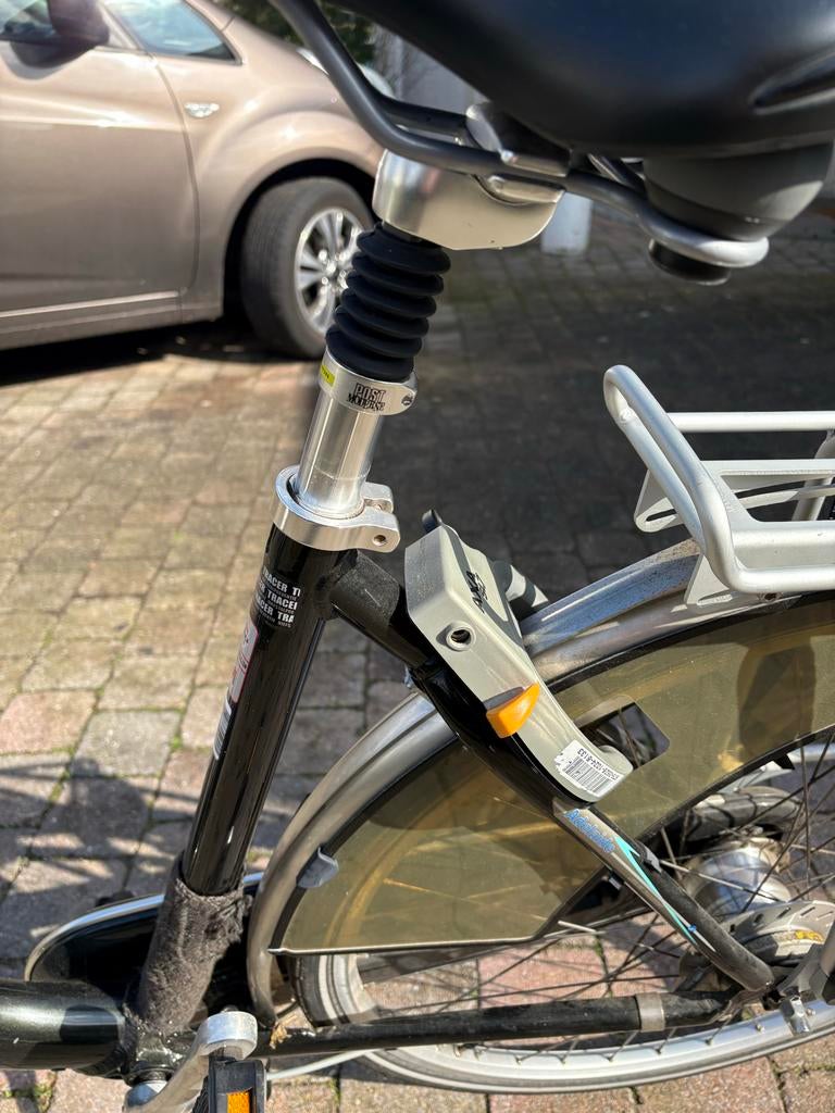 Stadsfiets met vering en bagagedrager zo goed als nieuw, Fietsen en Brommers, Fietsonderdelen, Ophalen, Zo goed als nieuw, Overige typen