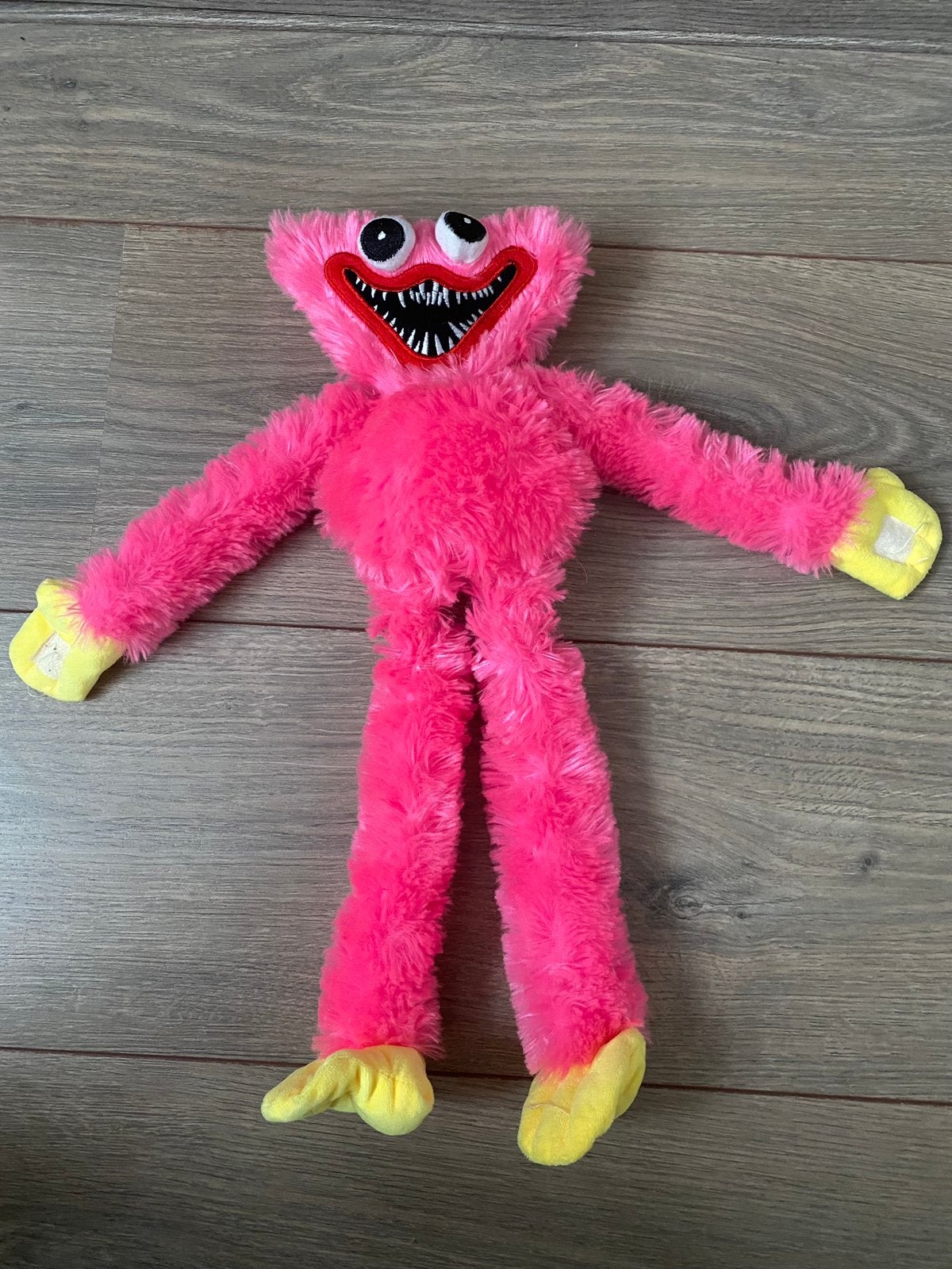 Roze huggy wuggy, Kinderen en Baby's, Speelgoed | Knuffels en Pluche, Ophalen of Verzenden, Zo goed als nieuw, Overige typen