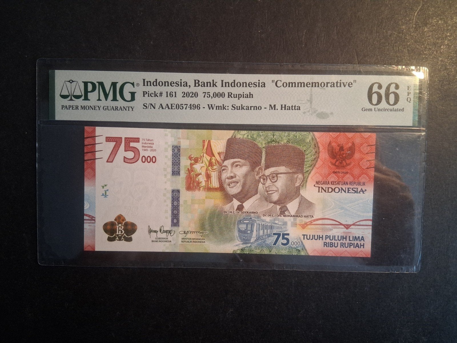 75.000 rupiah Indonesië aunc PMG  66, Ophalen of Verzenden, Zuidoost-Azië, Los biljet
