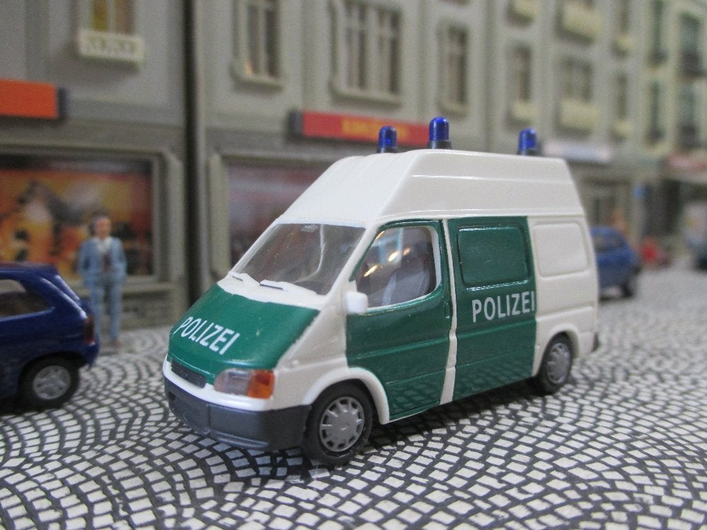Ford Transit Mk.3 Facelift SWB Hightop POLIZEI wit / groen, Hobby en Vrije tijd, Modelauto's | 1:87, Ophalen of Verzenden, Zo goed als nieuw