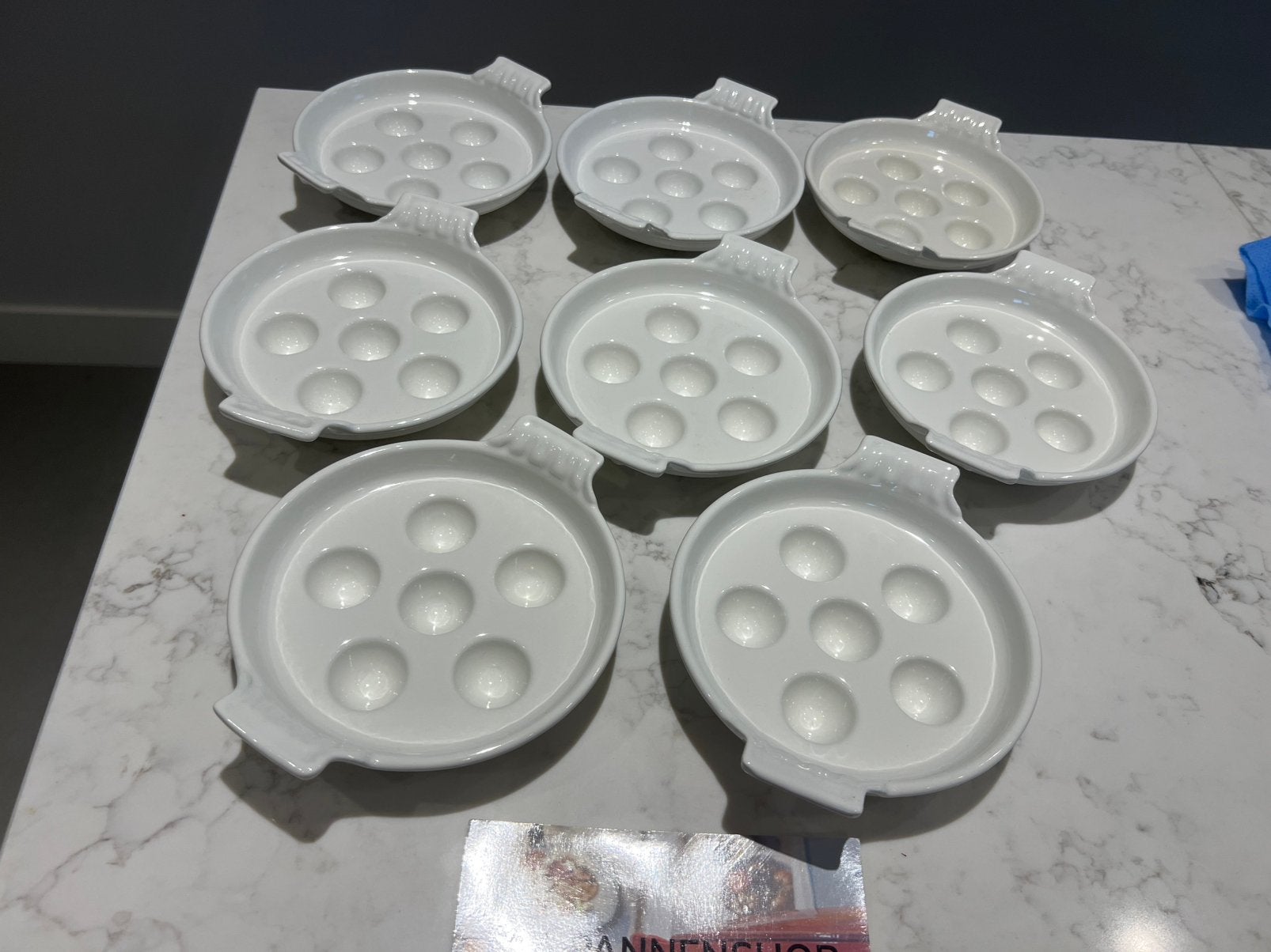 Set van 8 escargot bordjes van gietijzer, als nieuw, Huis en Inrichting, Overige typen, -, -, Ophalen of Verzenden