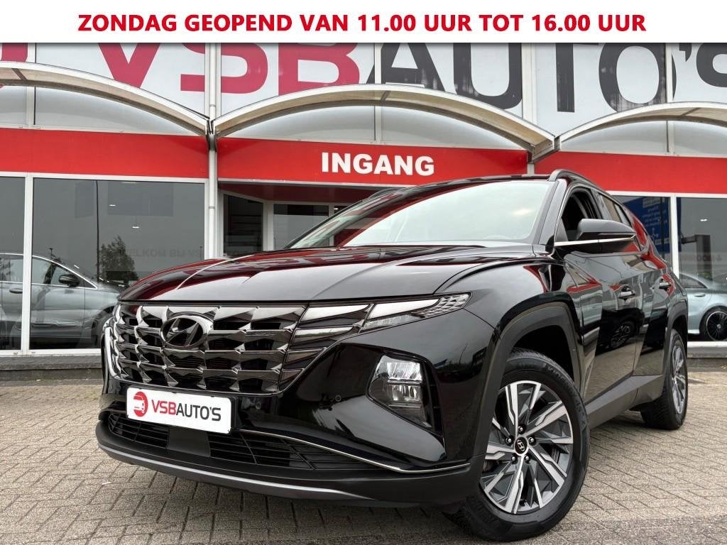 Hyundai TUCSON 1.6 T-GDI HYBRID 230PK AUT. LED NAVI CAMERA C, Auto's, Hyundai, Gebruikt, Huisgarantie, Met garantie (alle), Zwart