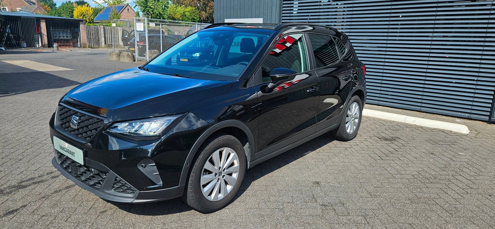 Seat Arona 1.0 EcoTSI Xperience Business Connect, Auto's, Gebruikt, Arona, Zwart, Leder
