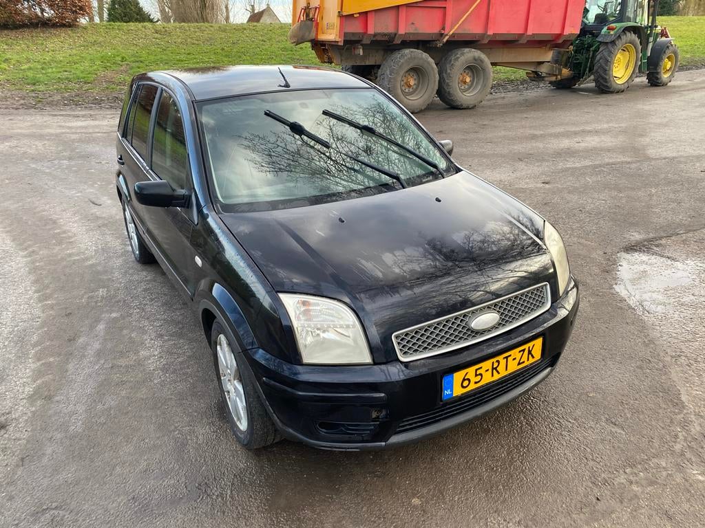 Ford Fusion 1.4 16V 2005 Zwart, Auto's, Voorwielaandrijving, 15 km/l, 40 €/maand, Zwart