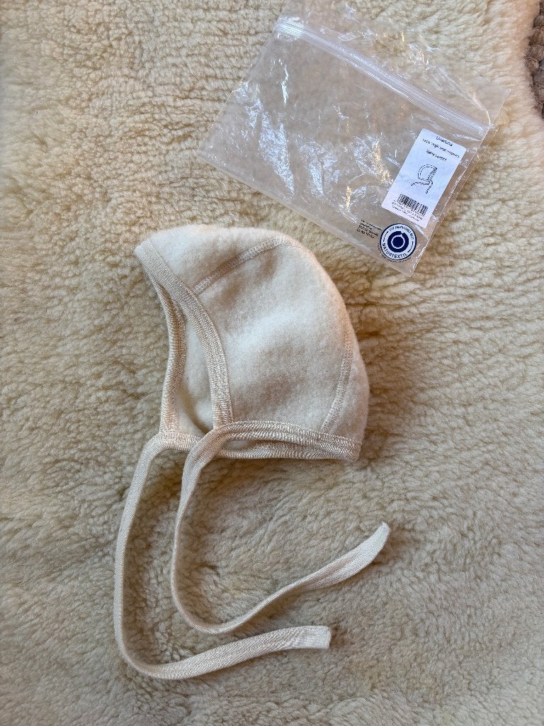 Strikmutsje wolfleece Unaduna naturel 74/80, Kinderen en Baby's, Jongetje of Meisje, Ophalen of Verzenden, Maat 74, Muts