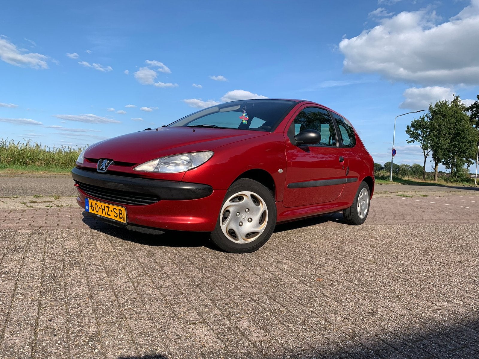 Peugeot 206 1.4 X-line 3D 2002 Rood, Auto's, Voorwielaandrijving, 31 €/maand, 4 cilinders, Origineel Nederlands