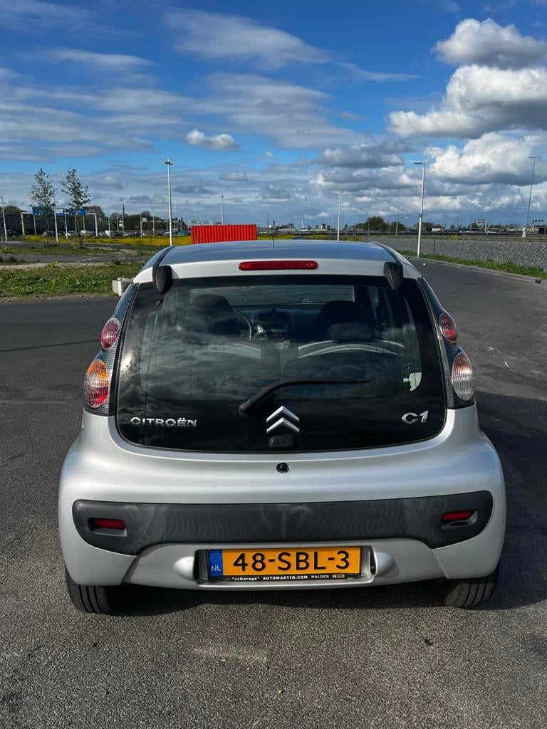Citroën C1 1.0i 68PK 5D 2011 Grijs, Voorwielaandrijving, Stof, Zwart, 4 stoelen